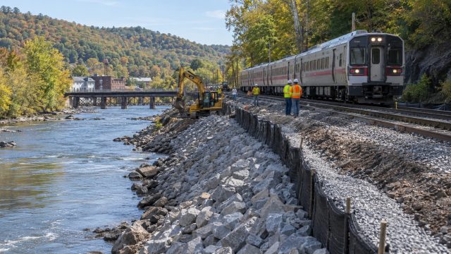 Riverside Rail Repair in Autumn